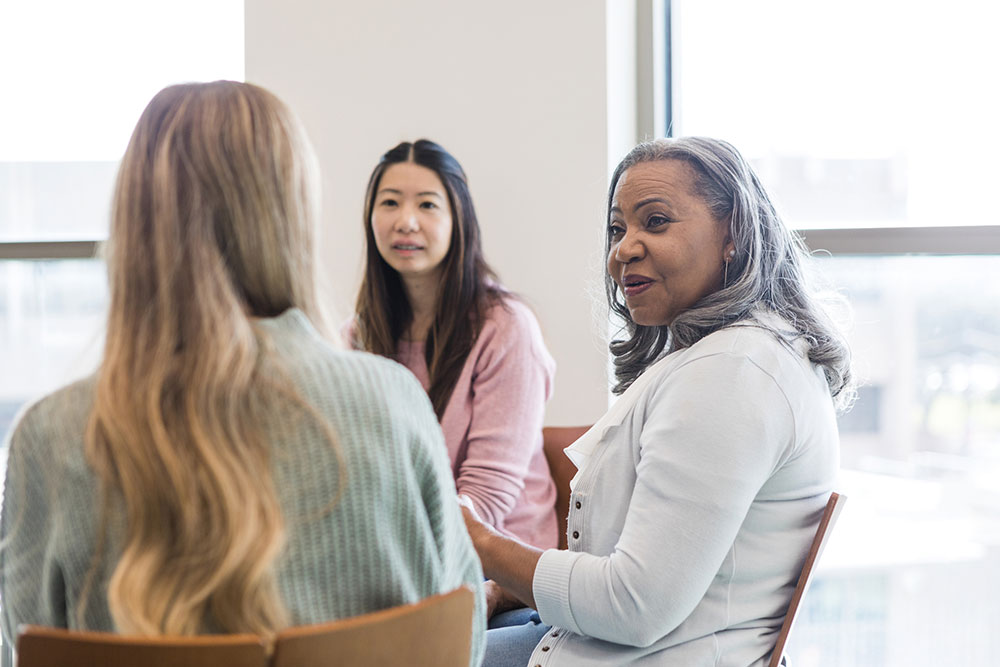 women in group discussion